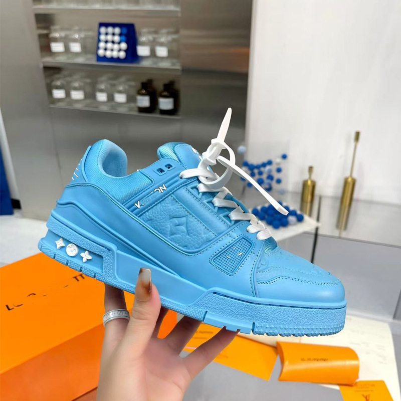 Zapatos de moda europeos Guangzhou de alta versión驴 entrenador zapatos deportivos ociosos de cuero universal para hombres y mujeres