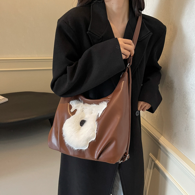 Perro peludo nuevo gran capacidad simple bolso de hombro bolso de mujer ocio nuevo versátil viaje multipropósito mochila