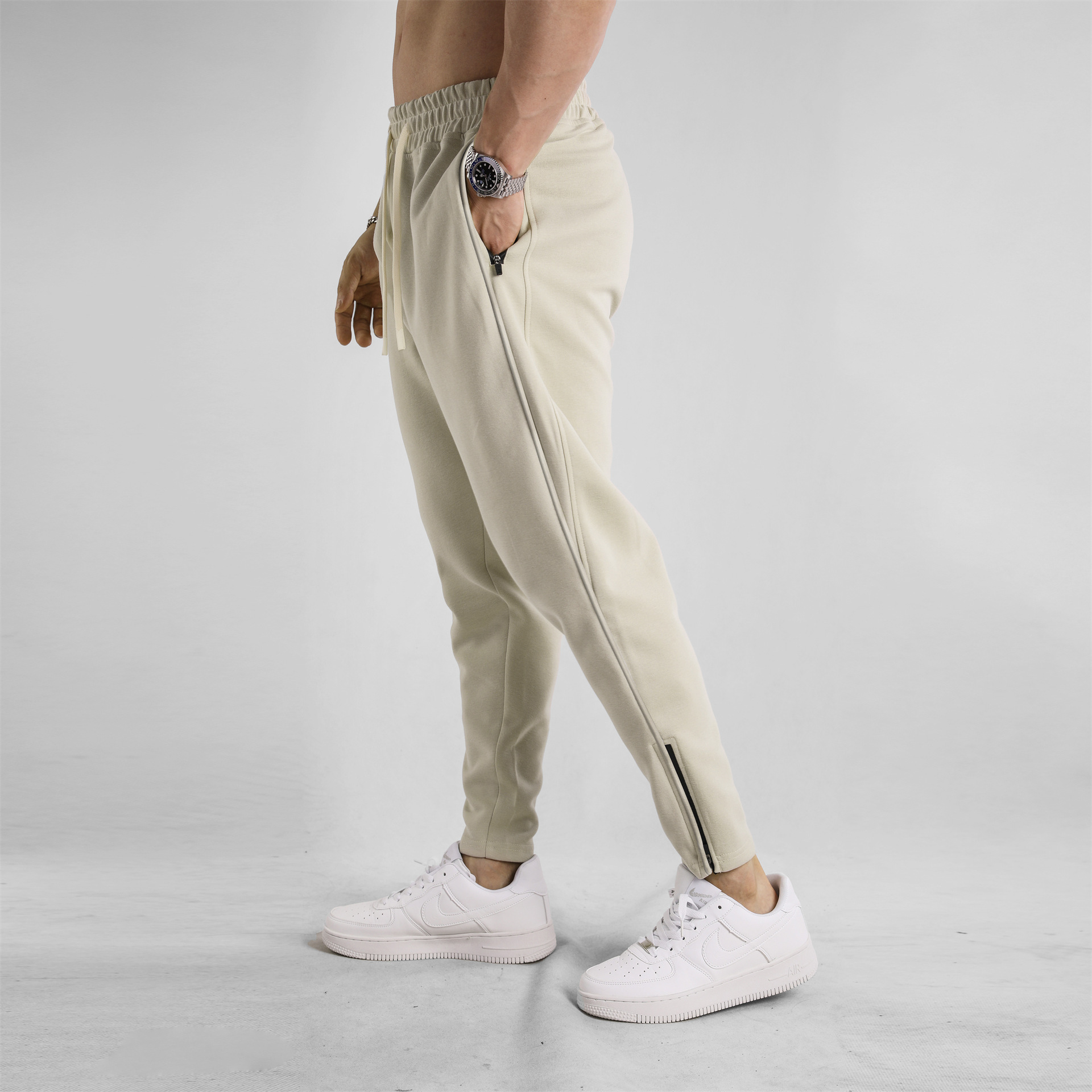 Pantalones largos de algodón de primavera y otoño para hombres, nuevos pies delgados, cremallera, pies, ocio, deportes de todo fósforo para jóvenes, al aire libre