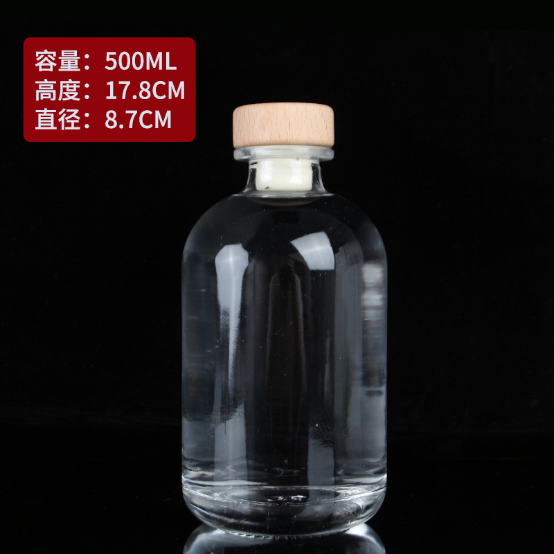 Botella de vidrio esmerilado transparente al por mayor botella de vino de fruta casera de cerveza botella de vino vacía botella de vodka botella de vino de ciruela cubierta de madera