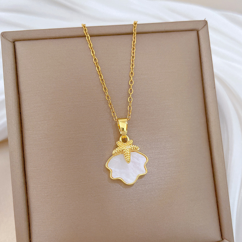 Colar de concha estrela do mar em aço titânio para mulher_voghion.com