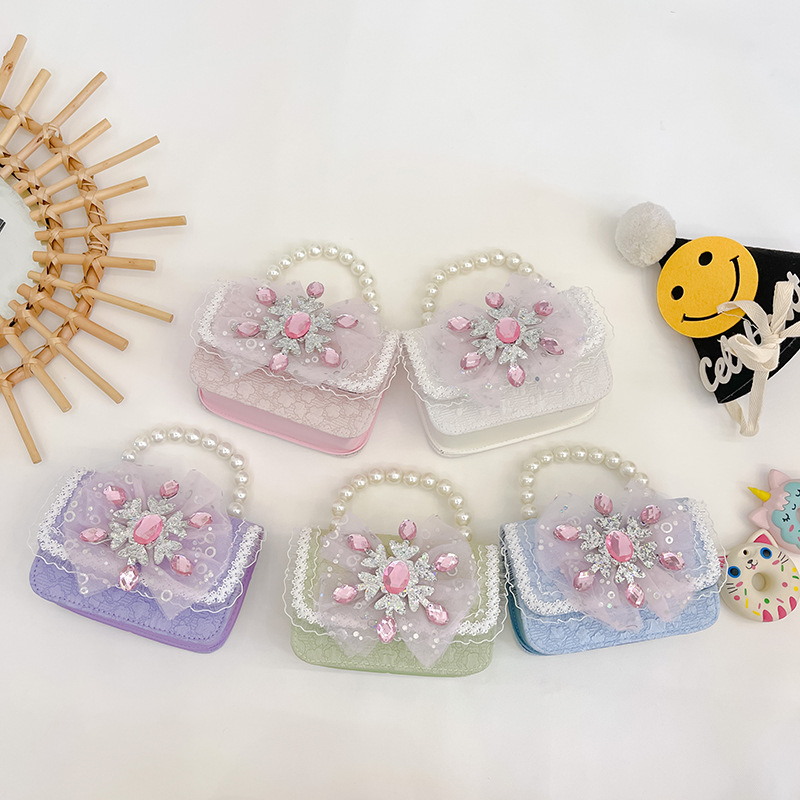 Nuevo arco niñas bolsa mensajero bolsa niños princesa Chanel estilo hombro bolsa bebé fuera moneda monedero bolsa