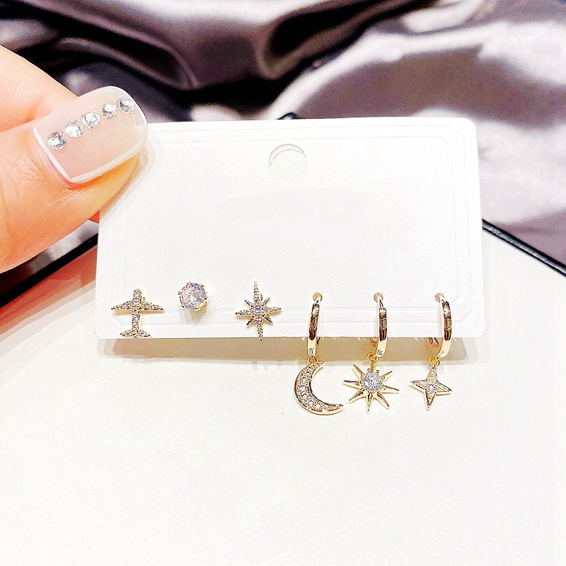 Wholesale Korean Zircon Micro-inlaid Small Plane Star Moon Copper Earrings Nihaojewelry display picture 4