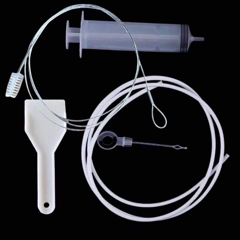 Household refrigerator drain cleaner set, including five cleaning brushes, a drain cleaning tool, a deodorizing box, and a syringe Household refrigerator drain cleaner set, including five cleaning brushes, a drain cleaning tool, a deodorizing box, and a syringe