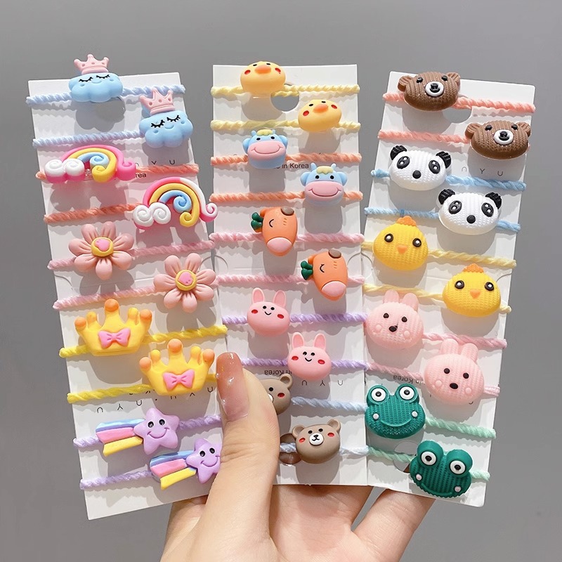 La cuerda del pelo del bebé de las muchachas de la banda de goma de los niños no lastima el pelo Los accesorios del pelo del pulgar del tamaño pequeño atan la banda de goma del pelo