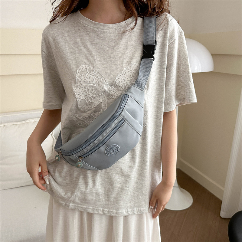 Nuevo nicho de diseño de bolso de cintura para hombres tendencia de personalidad estética 2024 verano almacenamiento de teléfonos móviles bolso de pecho de aire deportivo