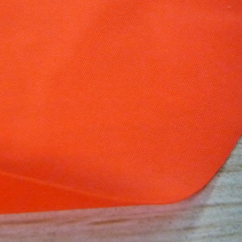 高可见性荧光橘红210D190T尼龙PVC复合防水布雨衣面料