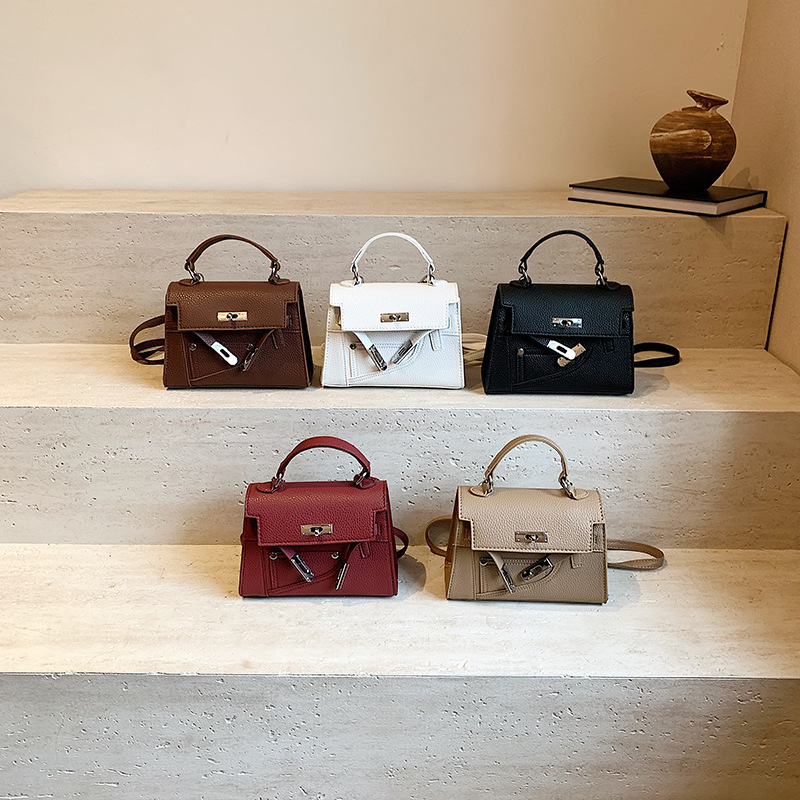 Nicho de diseño Kelley bolso 2024 otoño nuevo bolso de mano lichi mochila texturas extranjeras mochila para mujeres