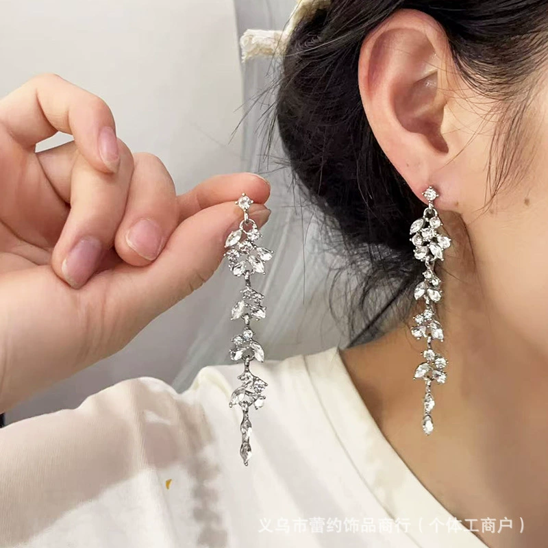 Женские серьги с кисточками для квадратного и круглого лица, серьги для похудения и высококачественные циркониевые серьги, нишевый легкий роскошный дизайн, универсальные зажимы для ушей оптом.