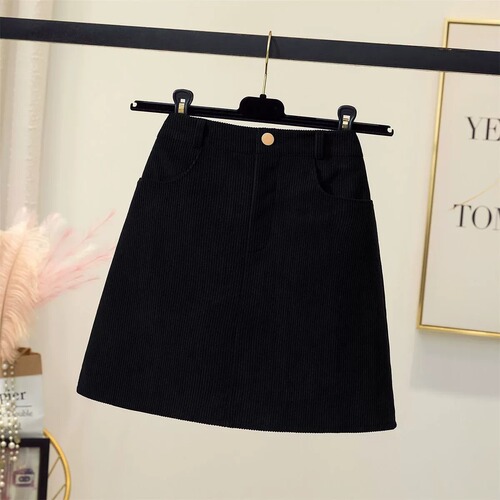 Black corduroy half-length skirt for plus-size women, autumn and winter, body-hugging, A-line, slimming, versatile one-step short skirt.