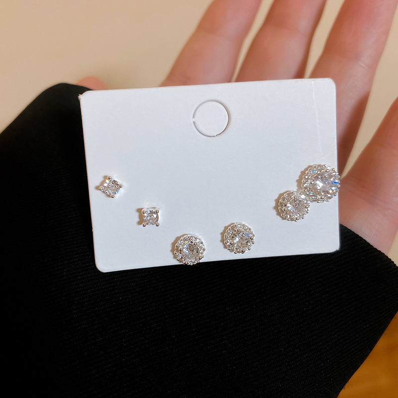 Pendientes de perlas de flor de circón de aguja de plata, pendientes de lujo de alta gama de lujo ligero exquisito, pendientes de todo fósforo blanco de moda de nicho al por mayor