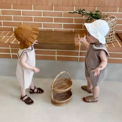 Baby clothes summer baby navy style lapel pocket jumpsuit male and female baby baby bag farts and clothes