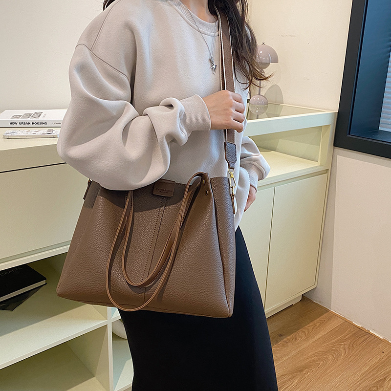 Bolsa de viaje de moda simple para mujeres 2024 nueva gran capacidad versátil bolso de hombro retro bolso de viaje