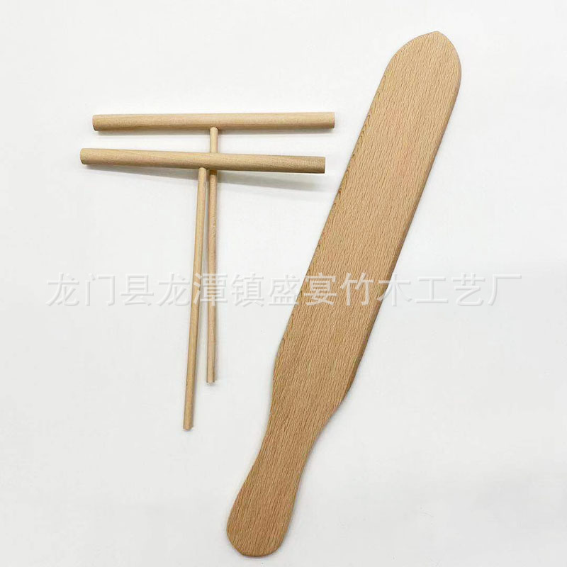 卵焼きの木の熊手の果実の屋台のパンケーキの木の熊手の木の押し棒の木のシャベルの卵の餅の屋台のパンケーキは押します。|undefined