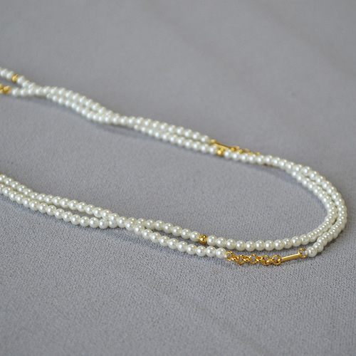 French-style minimalist Chanel-inspired high-luster small pearl chain multi-layer long pendant necklace for women to layer in autumn and winter
