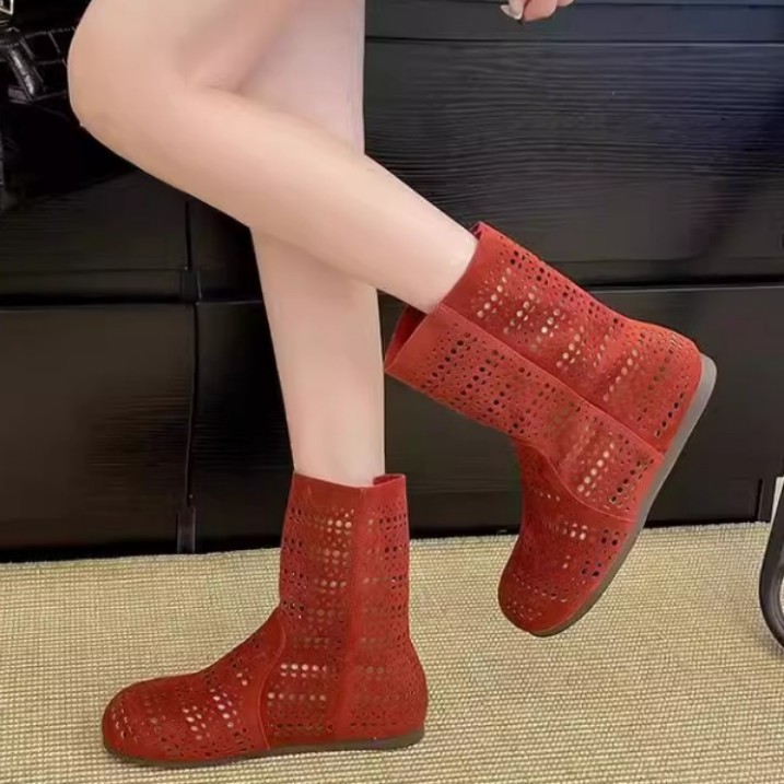 Fuego explosivo cómodo ventilador plano hueco botas Martin para mujeres red 2026 nuevo ventilador versátil agujero botas cortas zapatos individuales