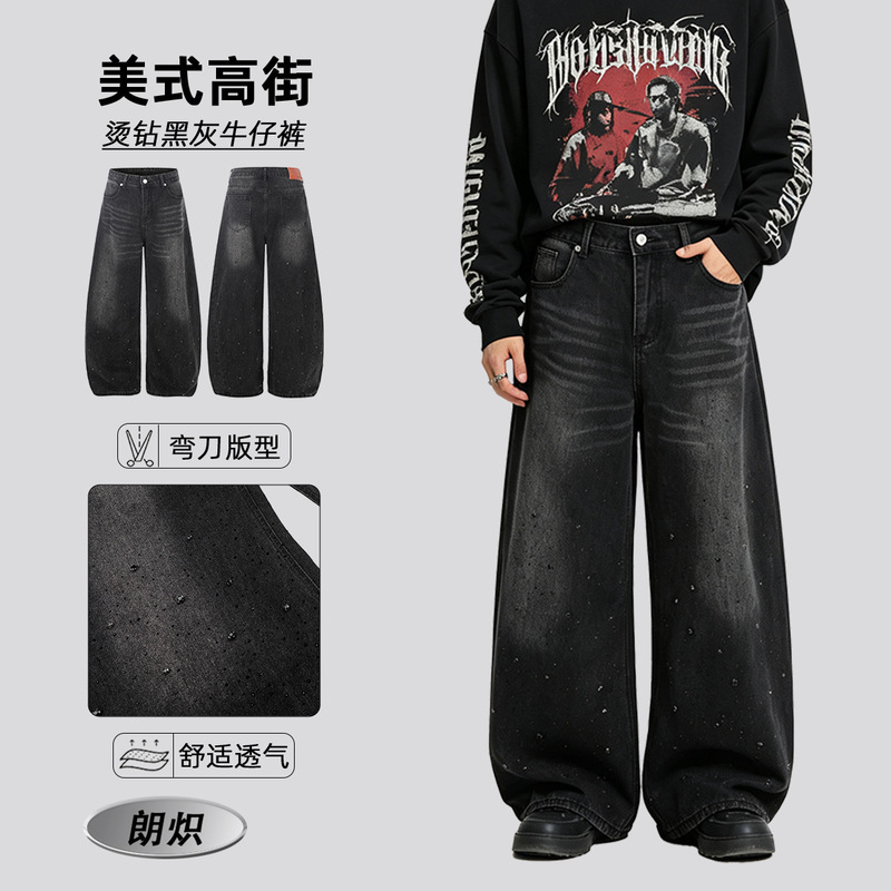 American-style men's jeans with a vintage wash, distressed look, rhinestone accents, and cat-ear pattern design, in a boyfriend style with loose wide legs