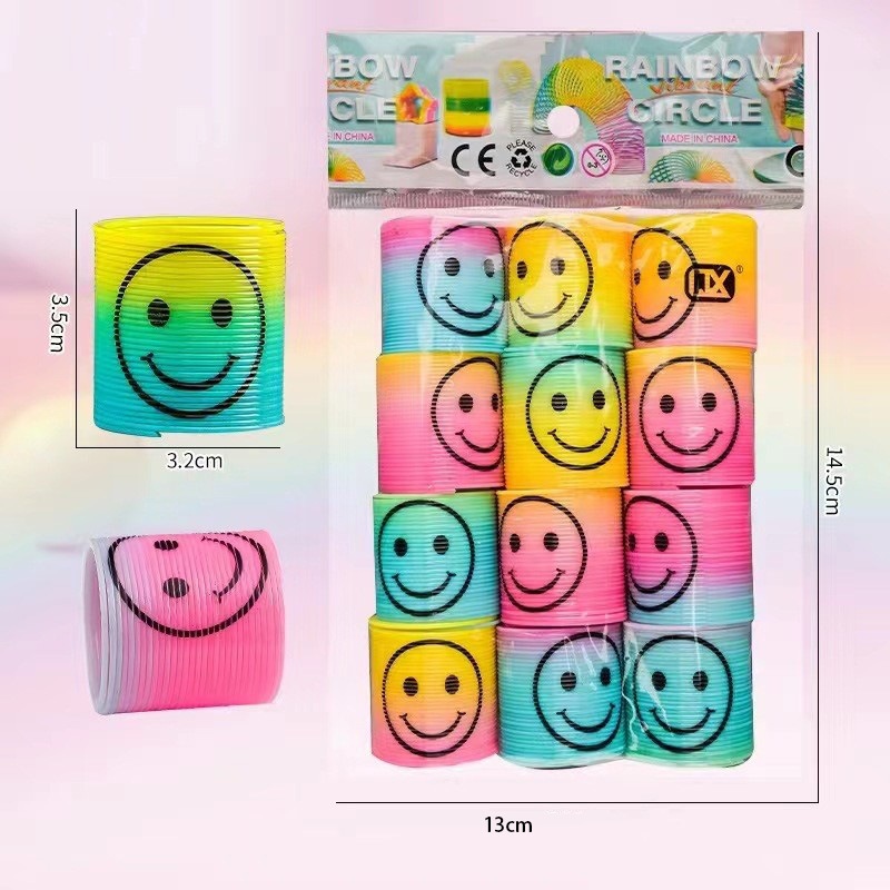 Corazón mágico arco iris bobina de plástico arco iris apilar música clásica puzzle juguetes para niños al por mayor