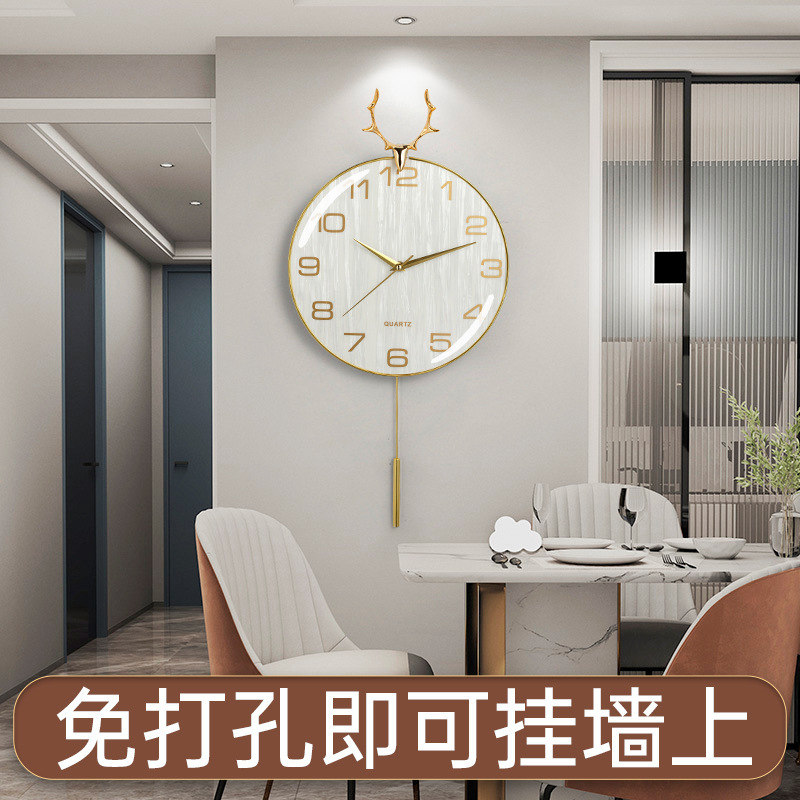 時計家庭用現代掛け時計の新型北欧の鹿の頭の時計の軽い豪華な掛け時計の客間は壁の石英の時計の卸売りを掛けます。|undefined