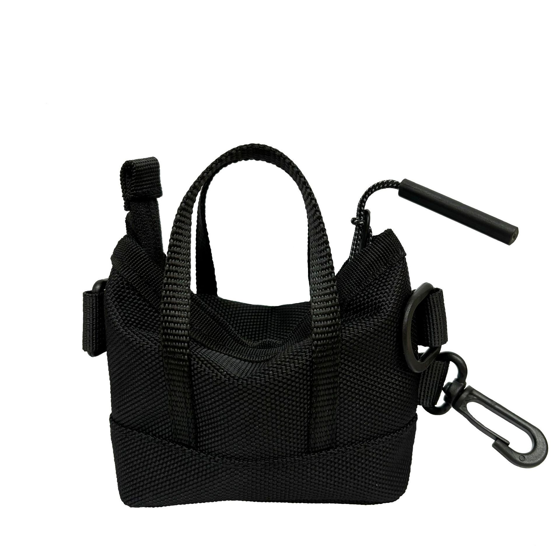 Mini bolso de montaje ligero, bolso de cambio portátil multifuncional, marca de moda con bolso de auriculares de montaje de bolso pequeño.
