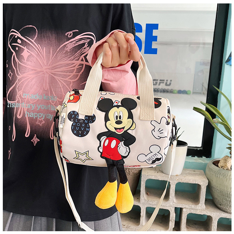 In 2024, the best-selling children's bags will feature cute Mickey Mouse-patterned bowling bags for girls, casual hand-held shoulder bags, and a unique style undefined