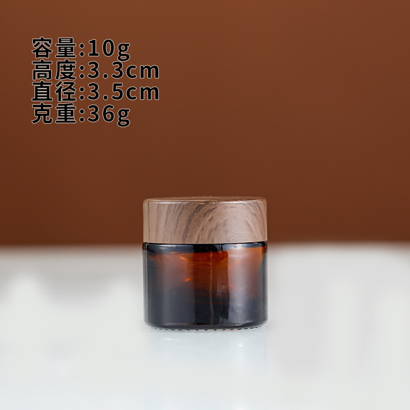 光を避ける茶色のクリーム瓶のガラス瓶は瓶の顔のクリーム瓶の目のクリーム箱の化粧品のサンプルの空の瓶のセットを分けます。|undefined