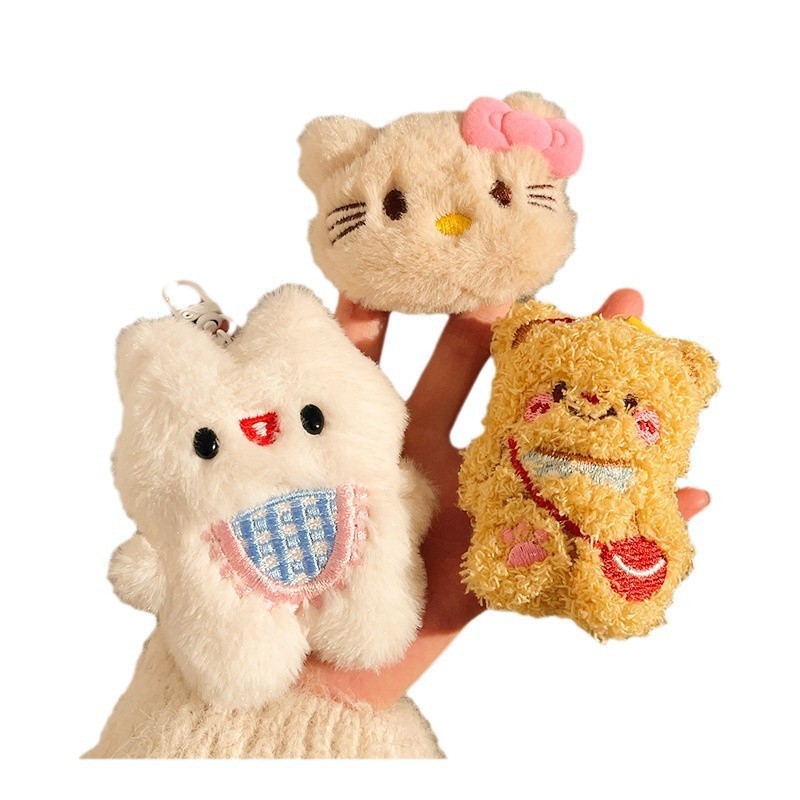 dibujos animados empujar pequeños regalos para tirar muñecas de vacaciones agarrar muñecas máquina de peluche pequeño regalo colgante muñeca llavero
