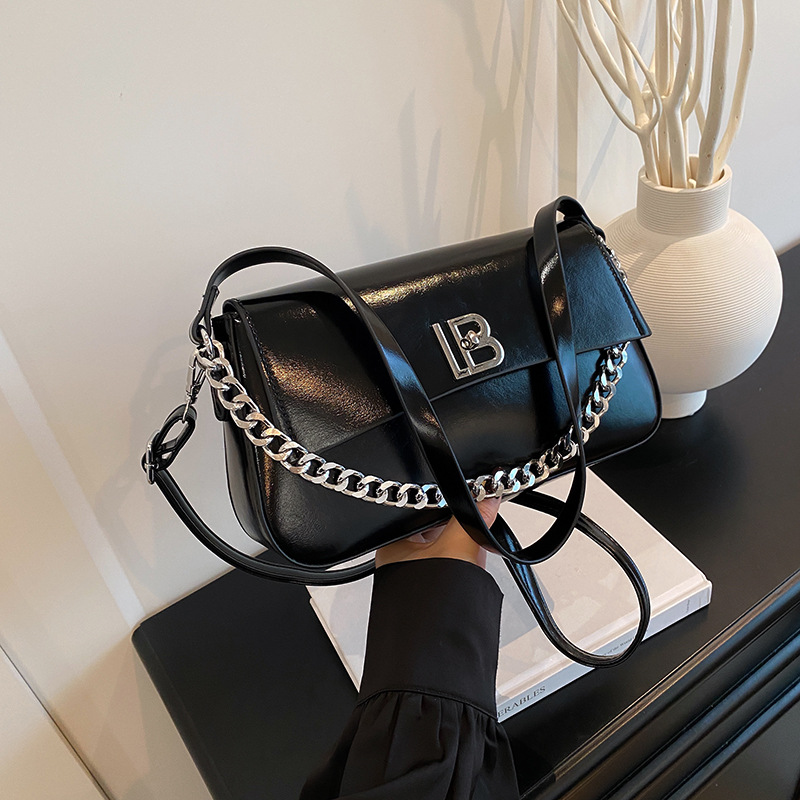 Bolso de axila de moda transfronteriza para mujer 2025 nuevo estilo de alta gama bolso de viaje simple bolso de mensajero de hombro salvaje al por mayor
