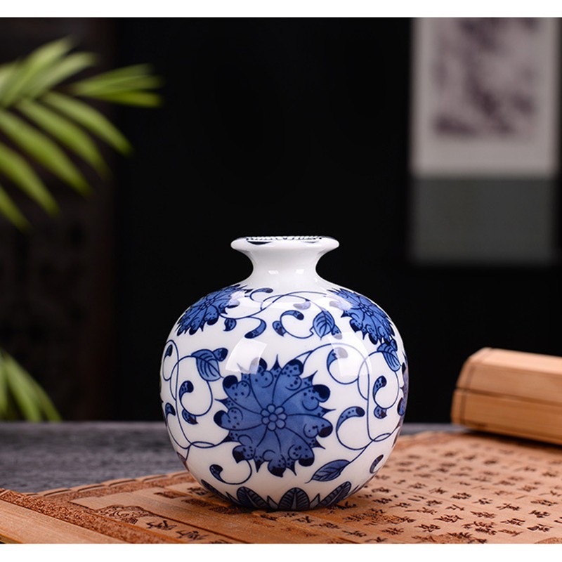 Flores de porcelana azul, vasos de flores de cerámica de lujo ligero, flores de alto nivel, decoración de mesa de comedor de estilo nuevo chino
