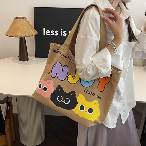 可爱卡通帆布单肩包包女字母印花托特包大容量通勤手提女包学生包