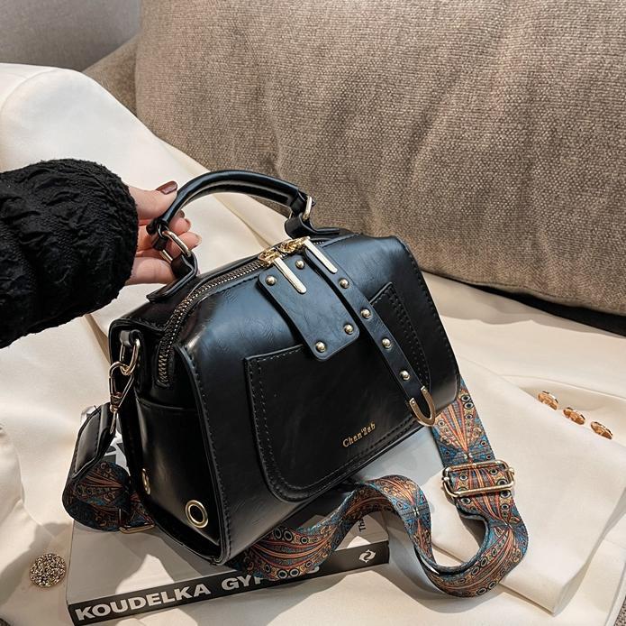 Bolso de viajero retro transfronterizo para mujer 2025 nuevo bolso de Boston casual simple moda bolso de mensajero portátil de todo fósforo