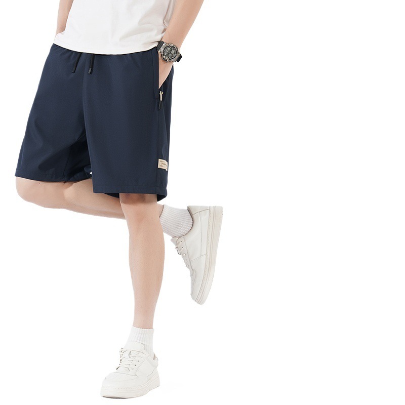 Verano nuevo estilo deportes ocio moda pantalones cortos hombres jóvenes secado rápido transpirable seda de hielo pantalones de cinco puntos estudiantes fitness running