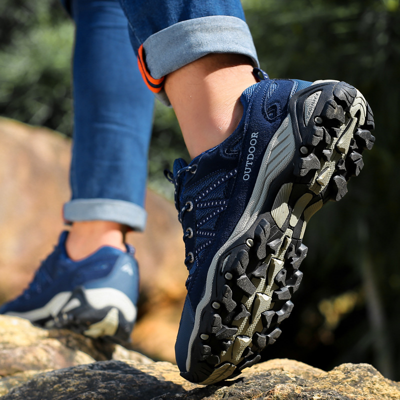 Una pieza de zapatos al aire libre de otoño y invierno para hombres tela de malla transpirable antideslizante pareja zapatos de montaña de montaña zapatos de montaña bajos