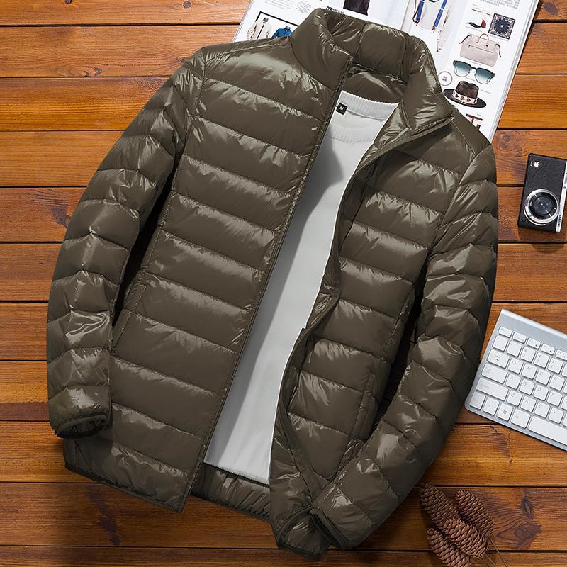 Chaqueta de algodón acolchado ligero para hombres cortos 2023 Otoño e Invierno Nuevo estilo coreano de moda guapo collar de pie chaqueta juvenil