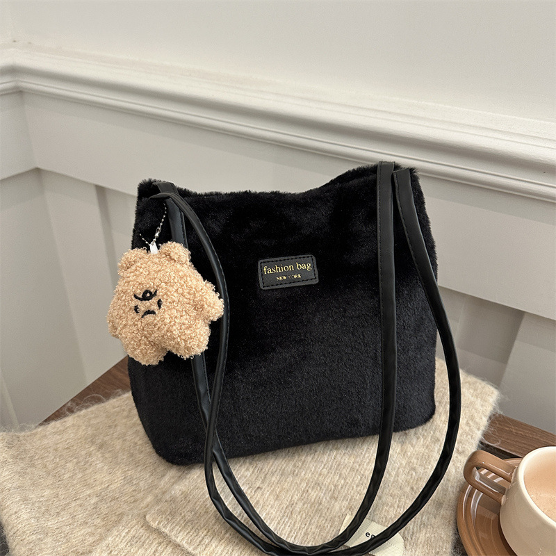 Bolso de felpa de moda de otoño e invierno para mujer 2025 casual todo-fósforo bolso de viaje de gran capacidad textura bolso de hombro