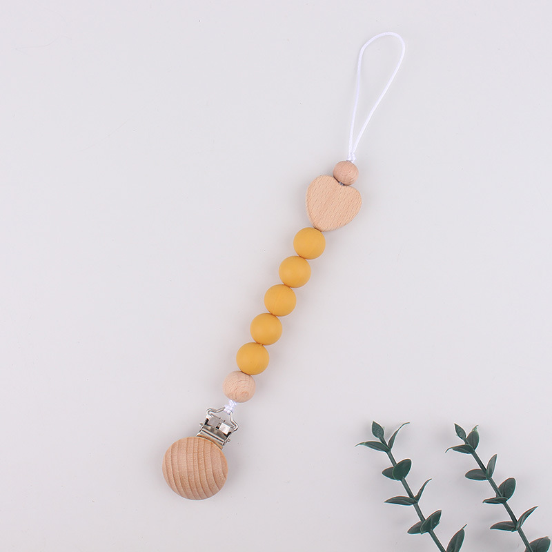 Clip de tetina de tres agujeros redondo de beech para calmar al bebé tetina de silicona de goma de diente anti-caída cadena