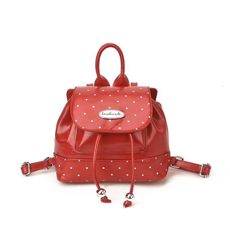 2026 nueva mochila infantil de moda coreana pequeña mochila de viento fragrante punto de onda de aire extranjero para niños y niñas mochila de cuerda de la moda