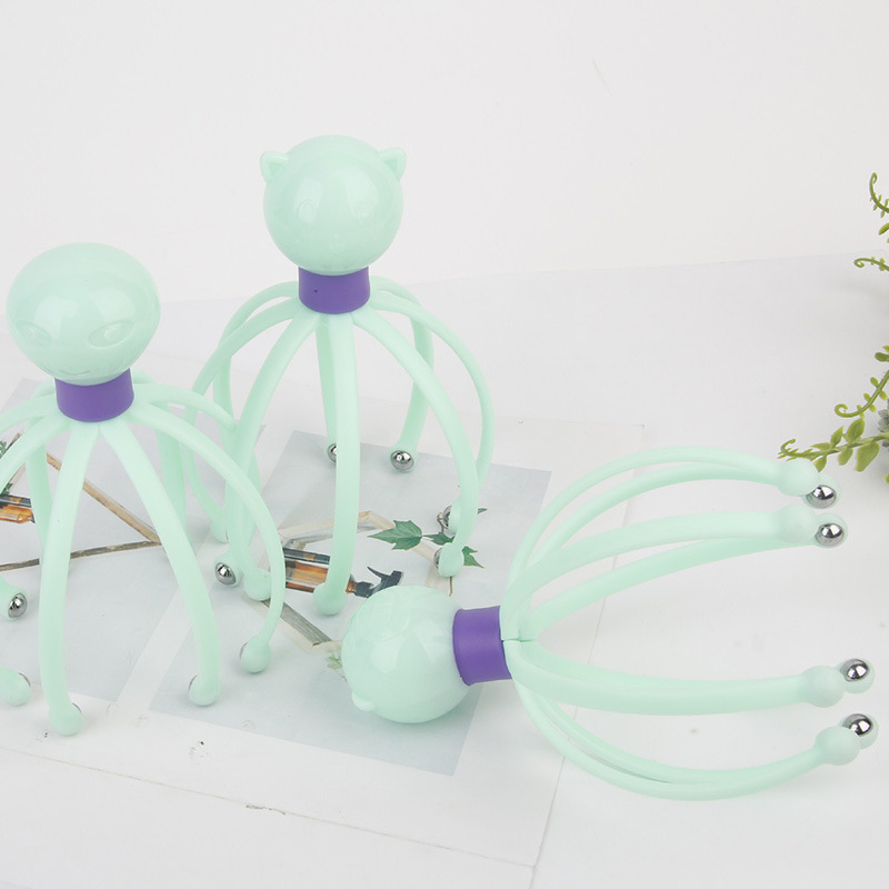 頭の経絡の頭をつかむ器の磁気ボールはマッサージの器具を持ってリラックスして頭皮の八爪の魚を押して便利に回転して卸売りします。|undefined