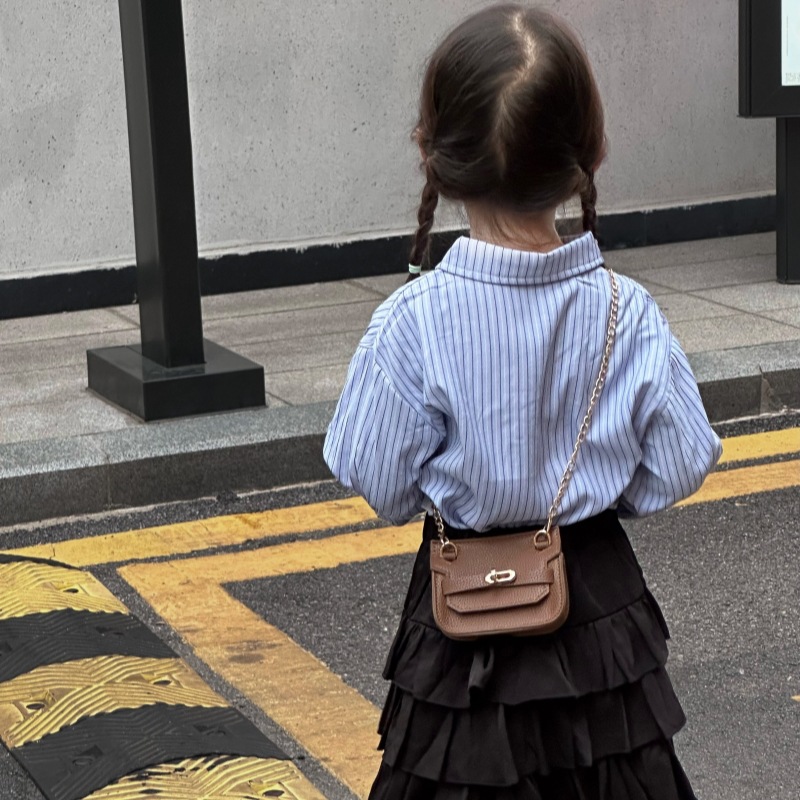 Nuevo bolso de cambio infantil coreano de moda de color sólido mini mochila de bebé comercio exterior accesorios de cadena bolsa de moda