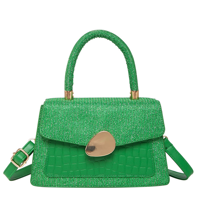 Hong Kong retro caramelo bolso de mujer 2025 moda nueva mochila de moda estilo extranjero cocodrilo empalme bolso pequeño