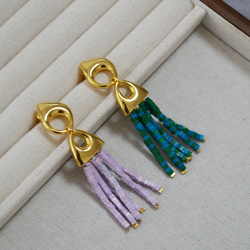 Small design retro fashionable green earrings with tassels