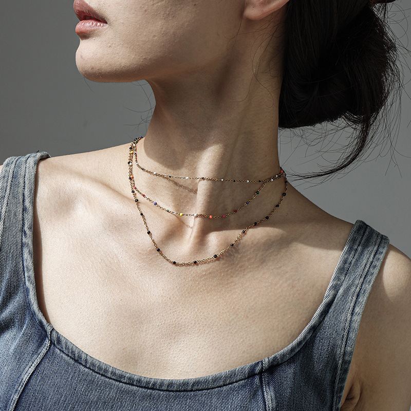 Collar de acero de titanio colorido de goteo de aceite europeo y americano de la moda de primavera y verano con collar de acero inoxidable para mujeres