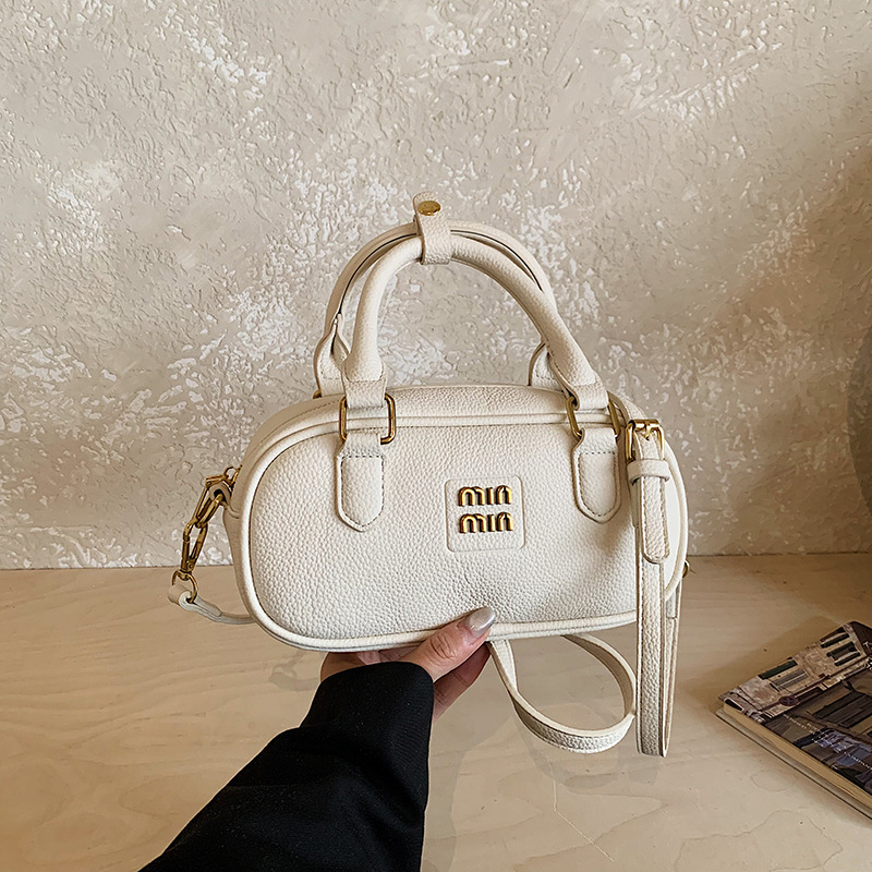 Bolsa de bolos retrógrada 2026 nueva moda ligera de lujo bolso cuadrado bolso de hombro universal