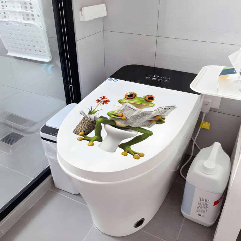 外国貿易の新しいアイデアのカエルは新聞の浴室のトイレの防水便器の蓋を見ます。|undefined