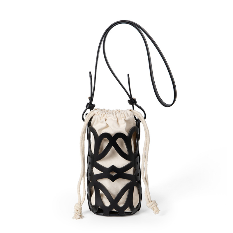 Bolso de mujer 2022 nuevo diseño de nicho hueco cordón lienzo cilindro pequeño bolso personalizado retro crossbody bolso de hombro