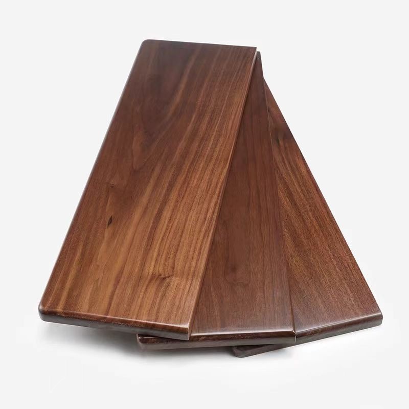 Solid wood panels in walnut color, nailed together to form table tops, shelves, and storage panels, made of thickened wood