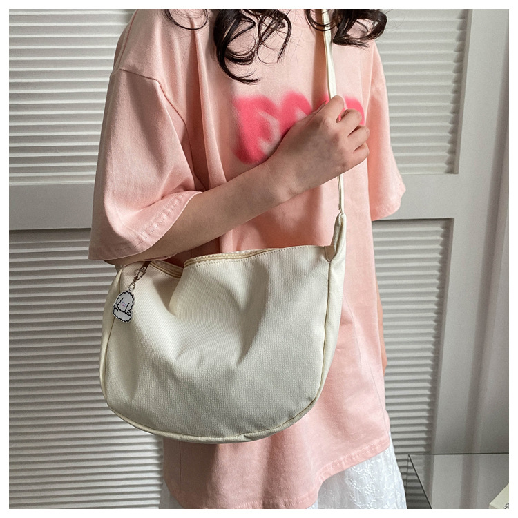 Large capacity canvas shoulder for women in spring summer 2023, new solid color, simple and fashionable casual bag,_voghion.com