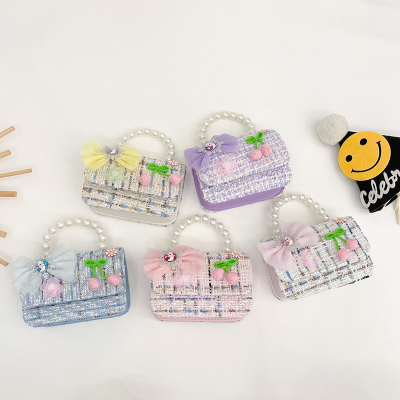 Nuevo bolso de mensajero de La Niña de los niños niña estilo de Chanel estilo occidental Linda niña linda de dibujos animados portátil pequeña bolsa