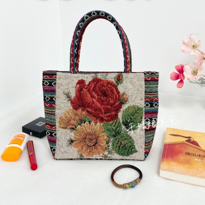 Nuevo retro con Jacquard de oro dorado de doble cara encriptado y engrosado bordado bolso de mano de vela nacional bolso de mano