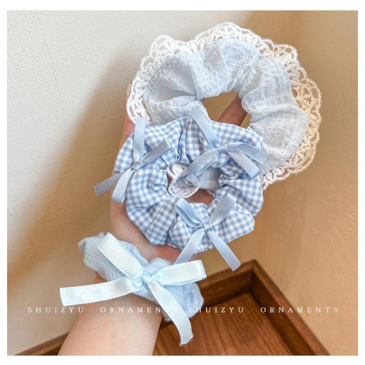 Blue ponytail with bow